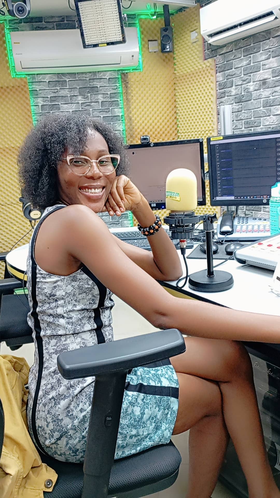 Dorcas Koki on-air at the radio mic